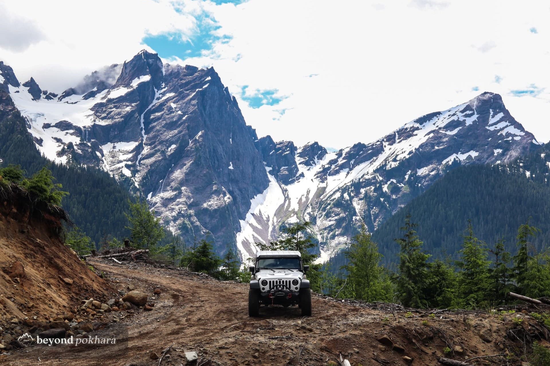 A 4WD jeep on a rough mountain road